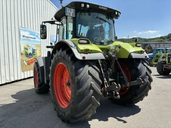 CLAAS ARION 650 CEBIS  - Photo 7